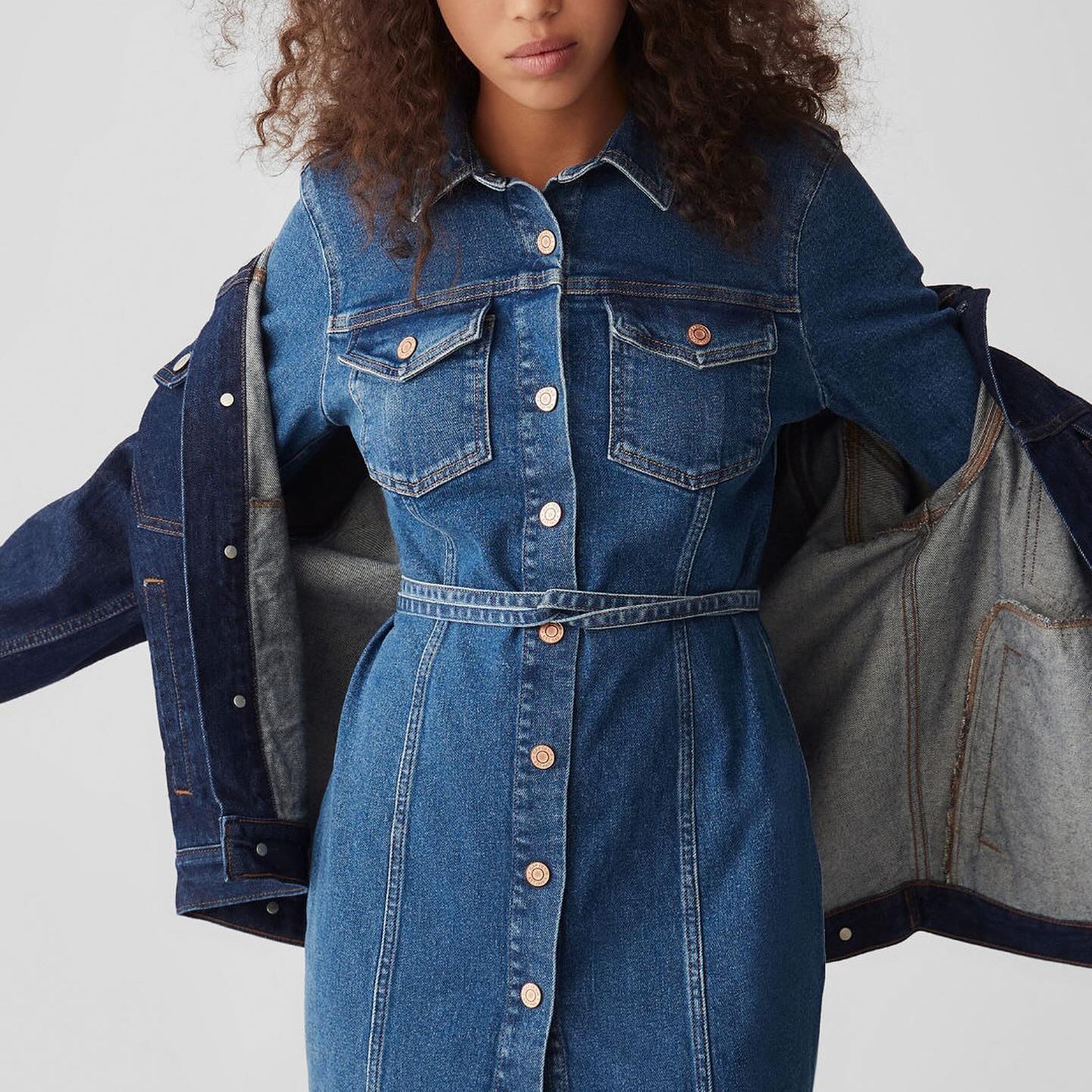 Gap Gap woman wearing denim button up dress and jacket
