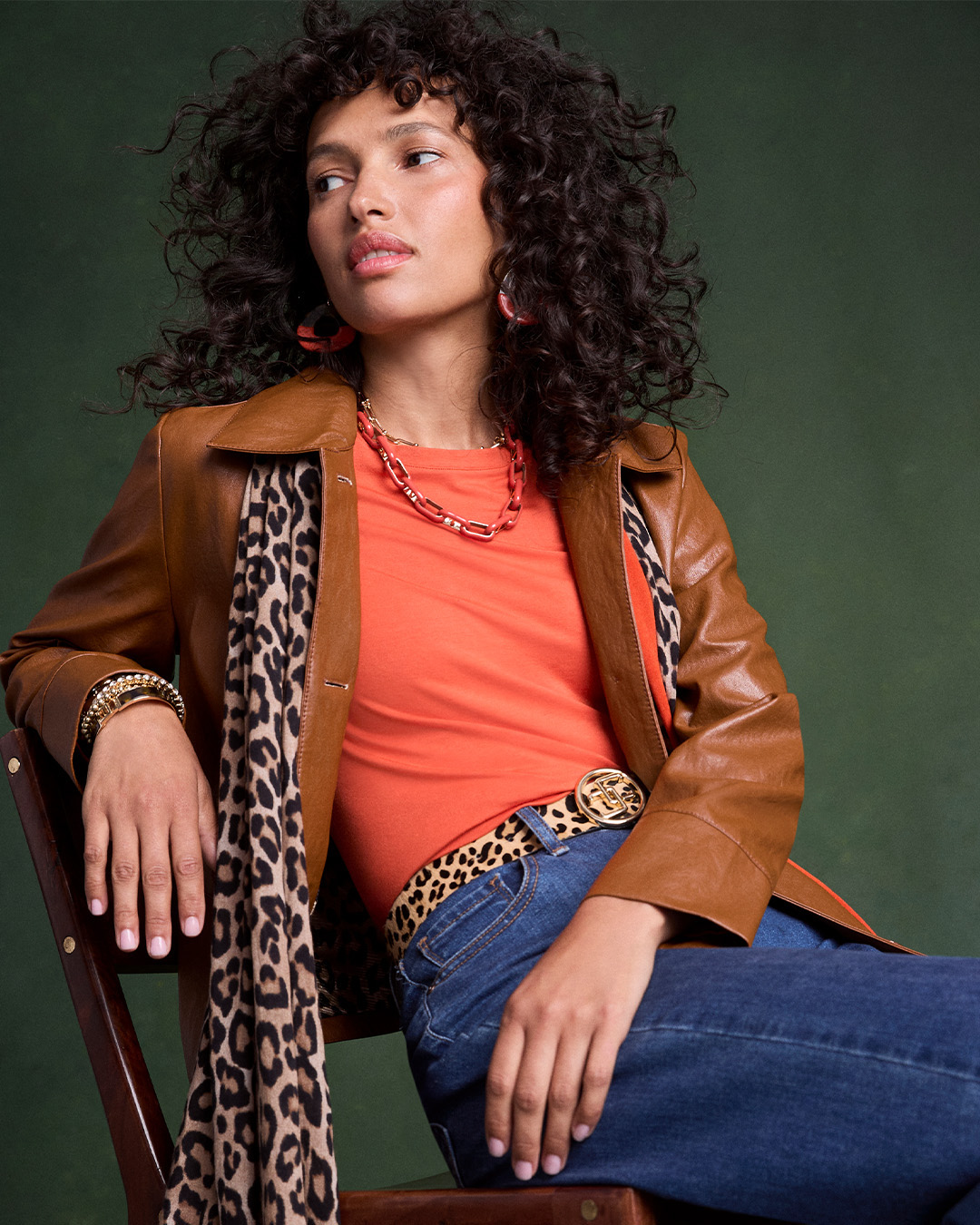 458504766_1562485491014127_6831911178476859434_n model in a chair sitting down