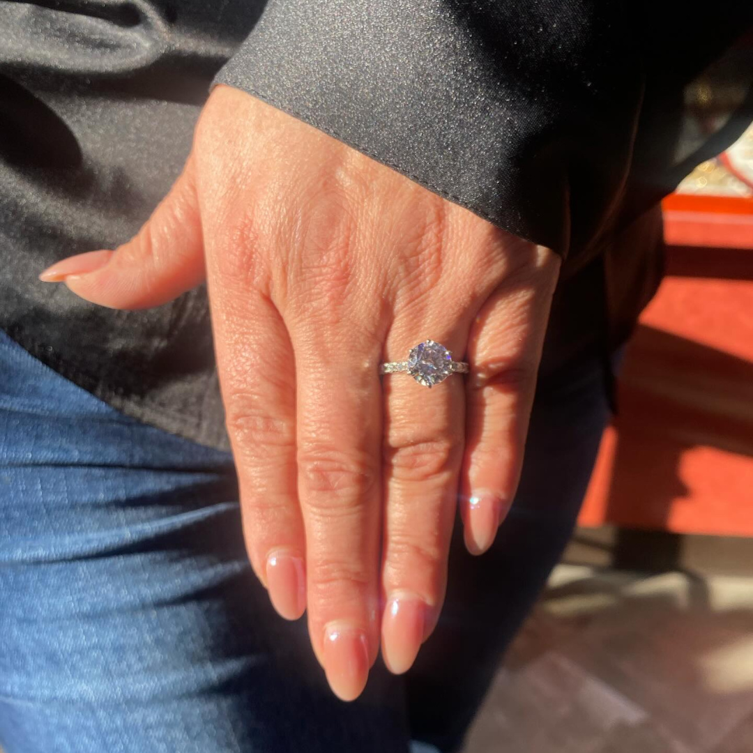 Untitled design (9) Alain Jewelers hand with ring